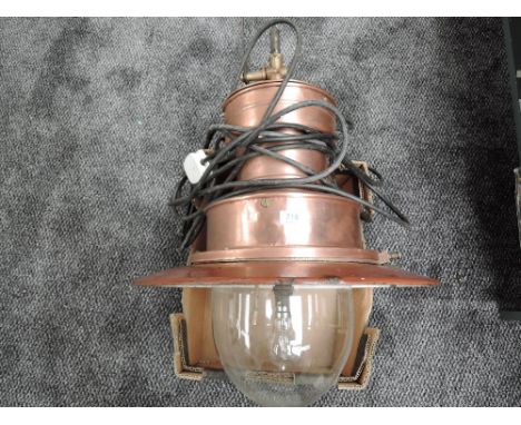 A Gas Oil Lamp from Newcastle Forth Goods Depot, copper and enamel with brass fittings and glass dome made by Suggs, converte