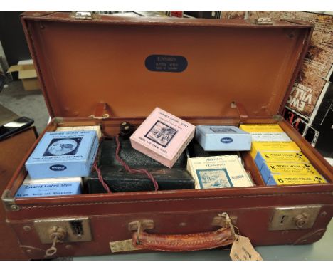 A Ensign Mickey Mouse Magic Lantern with Stories D, E &amp; and K along with many other boxed slides including The Elephants 