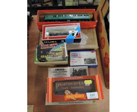 A selection of 00 gauge and model kits including Triang SR Motor Coach, Anbrico, Rowland Miniatures, Yard Crane etc
