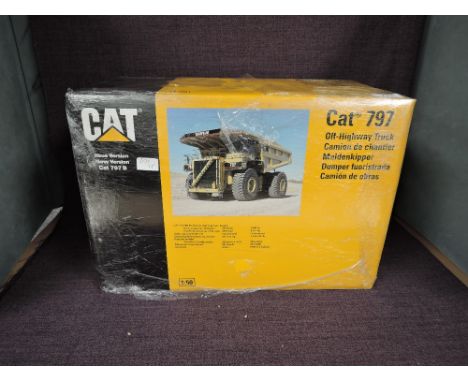 A NZG 1:50 scale diecast, Cat 797 Off-Highway Truck, New Version Cat 797B in original polystyrene packaging and outer box 466