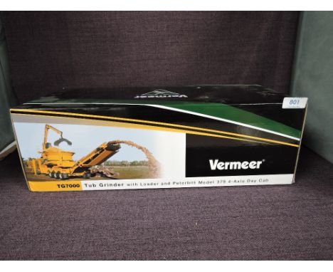 A TWH 1:50 scale diecasts, Vermeer TG7000 Tub Grinder with Loader and Peterbilt Model 379 4-Axle Day Cab in yellow, in polyst