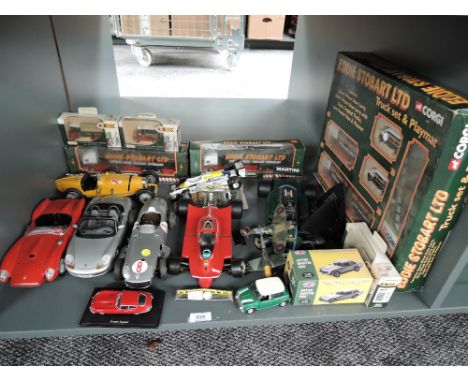 A box of mixed scale diecasts including 1:18 UT Model Porsche, Burago Ferrari, Bugatti Type 69, 1:14 Burago Ferrari and Marti