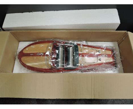A Riva Ariston model Speedboat, on stand, in card box with internal packaging