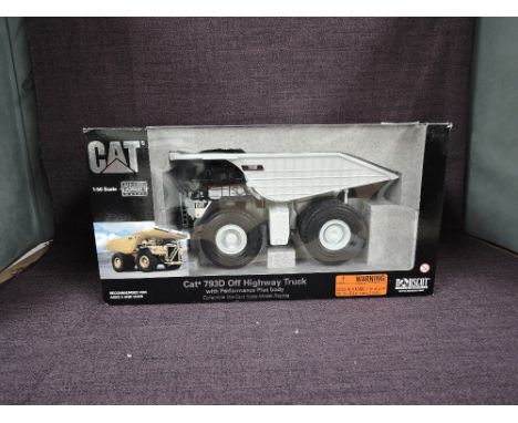 A Norscot 1:50 scale diecast, Cat 793D Off-Highway Truck, in white, in original polystyrene packaging and outer window box 55