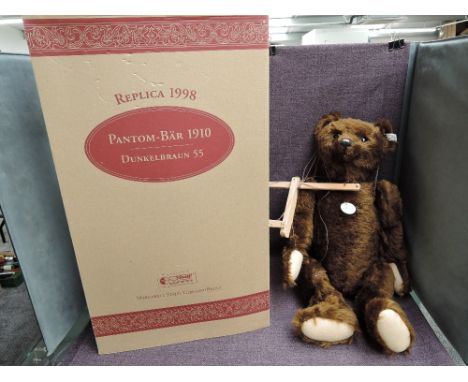 A modern Steiff limited edition Bear, Pantom-Bear 1919 Dark Brown Replica 1998, white tag 406614, with certificate 00548/4000