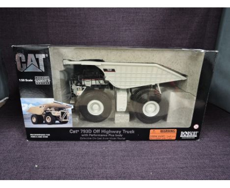 A Norscot 1:50 scale diecast, CAT 793D Off Highway Truck, in white, in original polystyrene packaging and outer window box 55