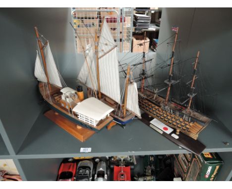 Three wooden modern model Sailing Boats, HMS Victory, Thonier and unnamed, all on wooden stands