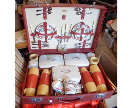 A vintage red cased Sirram picnic set