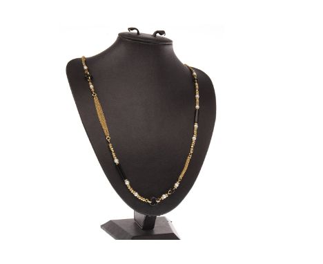 ART DECO STYLE NECKLACE, formed by multi stranded chain sections and black hardstone bars and discs along with pearls and gol