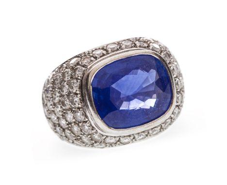 CEYLON SAPPHIRE AND DIAMOND RING, the cushion cut sapphire of approximately 7.96 carats, with accompanying certificate from t