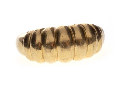 DRESS RING, the tall bezel formed by rounded ribbed sections, marked 750, size K, 12.4g