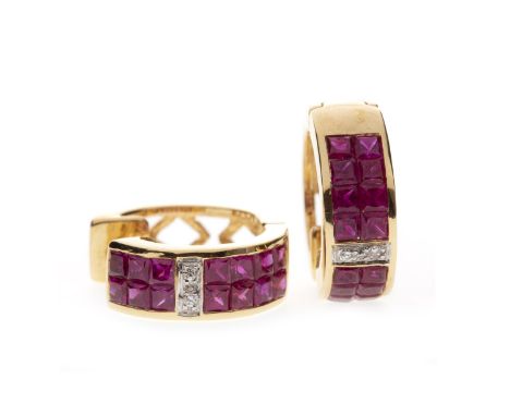 PAIR OF RUBY AND DIAMOND EARRINGS, each of hoop form and 15.8mm diameter, set with channel set square step cut rubies, possib