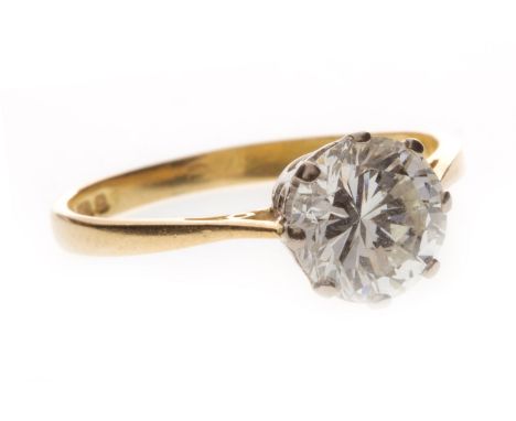 EIGHTEEN CARAT GOLD DIAMOND SOLITAIRE RING, set with an eight claw mounted round brilliant cut diamond of approximately 1.30 