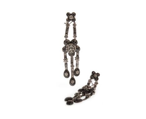 PAIR OF BLACK AND WHITE DIAMOND SET DROP EARRINGS, each formed by a quatrefoil stud with suspended floral motif and three ova