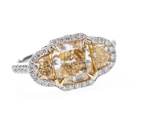 YELLOW AND WHITE DIAMOND RING, the central cushion cut yellow diamond of approximately 2.20 carats with accompanying certific