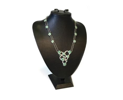 EMERALD AND DIAMOND NECKLET, the central rigid section formed by diamond set circles and emerald and diamond flowers, with fu