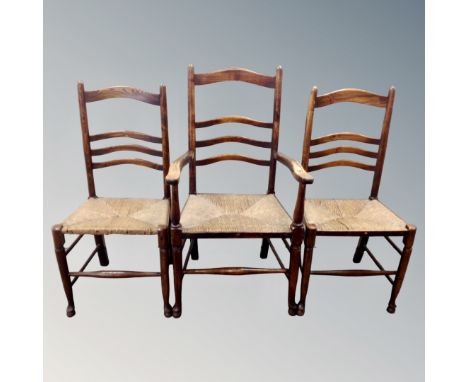A set of six beech ladder backed farmhouse kitchen chairs (carver and five singles)