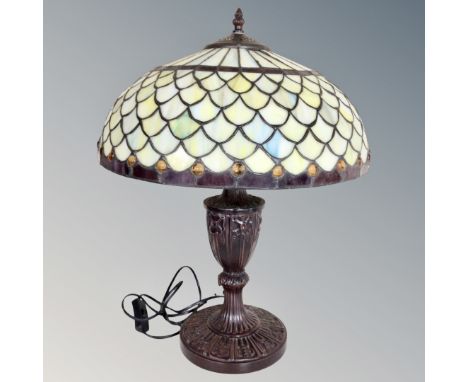 A Tiffany style table lamp with leaded glass shade 