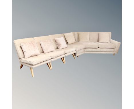 A mid-century three seater button back corner settee upholstered in a dralon fabric, together with three matching occasional 