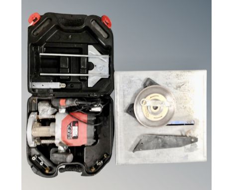 A Black and Decker router, in case, together with a Diamond Wheel tile cutter.