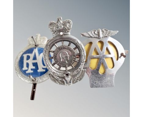 A vintage Royal Automobile Club car badge together with a further RAC and AA car badge.