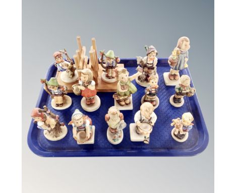 A tray of twelve West German Goebel Hummel figures, pair of bookends (14)