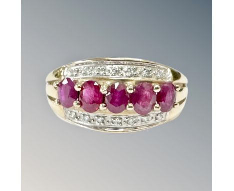 A 9ct gold ruby and diamond set ring, size M CONDITION REPORT: 2.3g