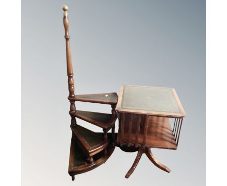 A set of library steps together with a book table on pedestal, both with leather inset panels.