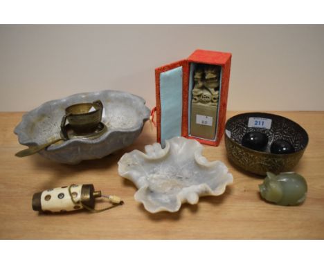 An Eastern bone snuff bottle, a Chinese carved stone seal 'Michael' an alabaster ash tray, a Persian brass bowl with embossed