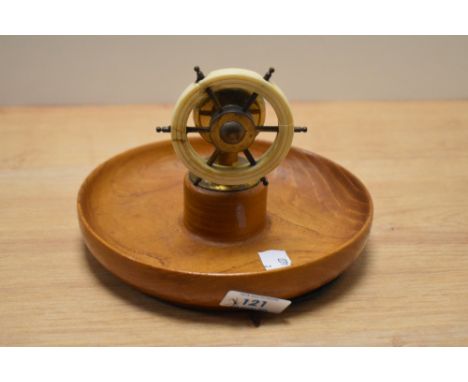 A mid century ships wheel nut cracker, mounted over turned elm or similar wood bowl.