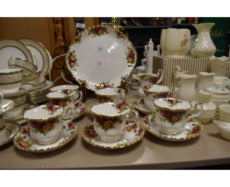 A selection of Royal Albert 'Old Country Roses' cups and saucers, jug, sugar basin and cake plate.