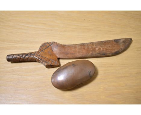 A 19th Century copper oval snuff container and a carved wooden knitting stick