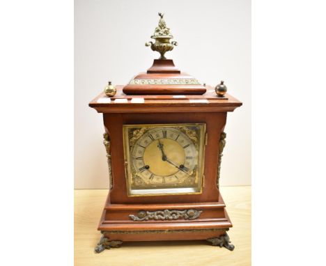 A late Victorian mahogany bracket style clock, the case having decorative gilt mounts and enclosing a two train movement, bra