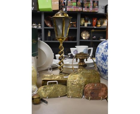 A collection of Victorian style tongue in cheek style brass and copper signs, an early 20th century embossed box raised on fe