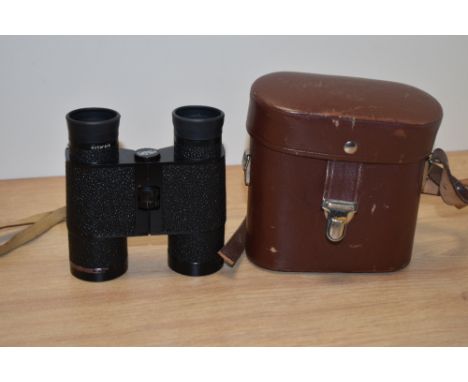 A pair of vintage Carl Zeiss Jena Notarem 8 x 32B binoculars, with brown leather case