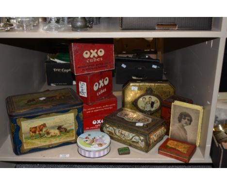 A selection of vintage tins, including OXO , Drawings pins tin and Quality Street.