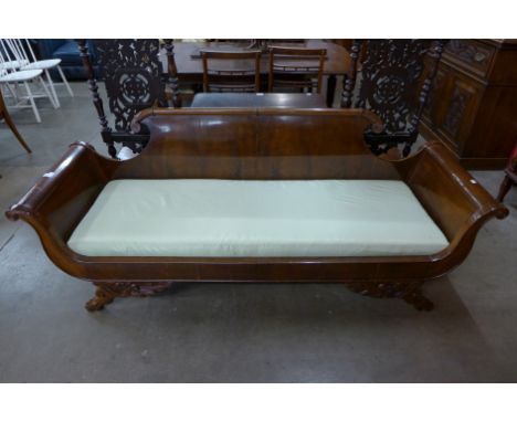 A French mahogany scroll end settee