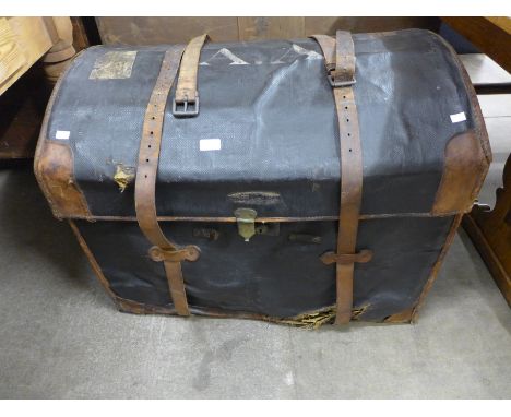 A 19th Century Schoolbred &amp; Co. leather banded steamer trunk