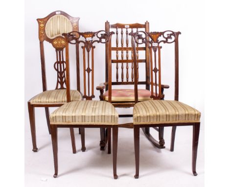 AN EARLY 20TH CENTURY ARTS AND CRAFTS STYLE PARQUETRY INLAID HALL CHAIR with floral inlaid decoration and pierced splat, reta