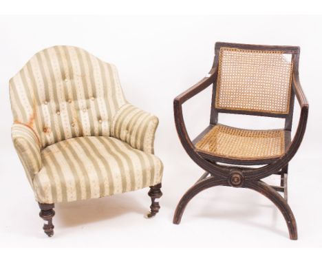 A 19TH CENTURY MAHOGANY LIBRARY ARMCHAIR with caned back and seat, and 'X' framed front 62cm wide x 82cm high together with a