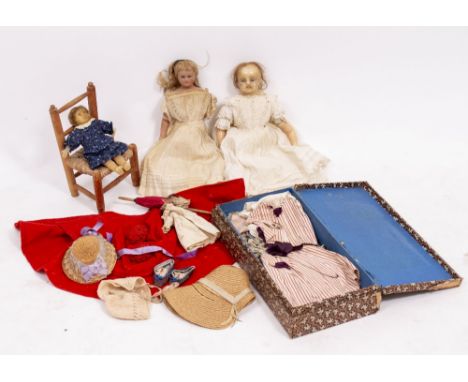 THREE VINTAGE WAX DOLLS to include two large and one small example, a miniature chair, doll's clothes, accessories etc (a qua