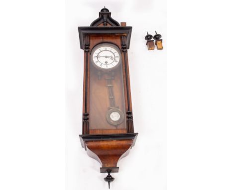 A 19TH CENTURY WALNUT AND EBONISED VIENNA TYPE WALL CLOCK  or timepiece with turned finials 26cm wide x 92cm high overall 