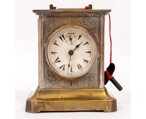A GERMAN JUNGHANS BRASS MUSICAL MANTLE CLOCK made for the Turkish market, 13.5cm wide x 15cm high