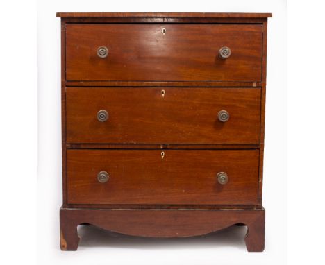 A VICTORIAN MAHOGANY SECRETAIRE CHEST with three drawers, the upper drawer with fitted interior and all standing on bracket f