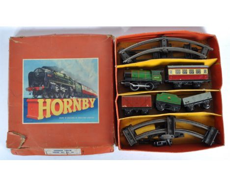 An original vintage Hornby Dublo O gauge tinplate clockwork model railway locomotive trainset No. 30 Goods Set. The set conta