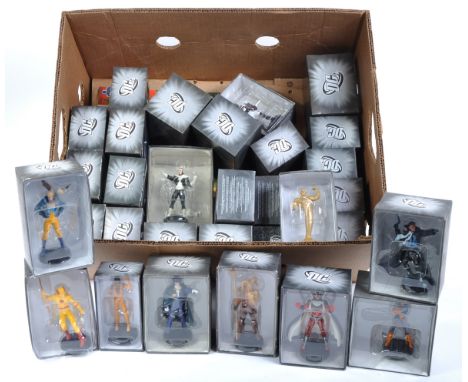A large collection of assorted DC Comics collectible chess pieces with accompanying Eaglemoss Publications magazines. Chess p