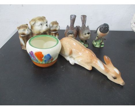 A Clarice Cliff "Crocus" pot (missing lid), along with three Beswick birds, Russian deer figurine etc