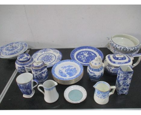 A collection of blue and white china including Spode, Worcester etc.