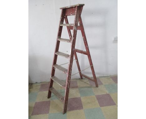 A vintage wooden step-ladder