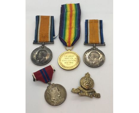 Three WWI medals, 2 awarded to 49344 Private WTC Brown Yorkshire Light Infantry, the other to 23207 Private T Smith, Bedfords